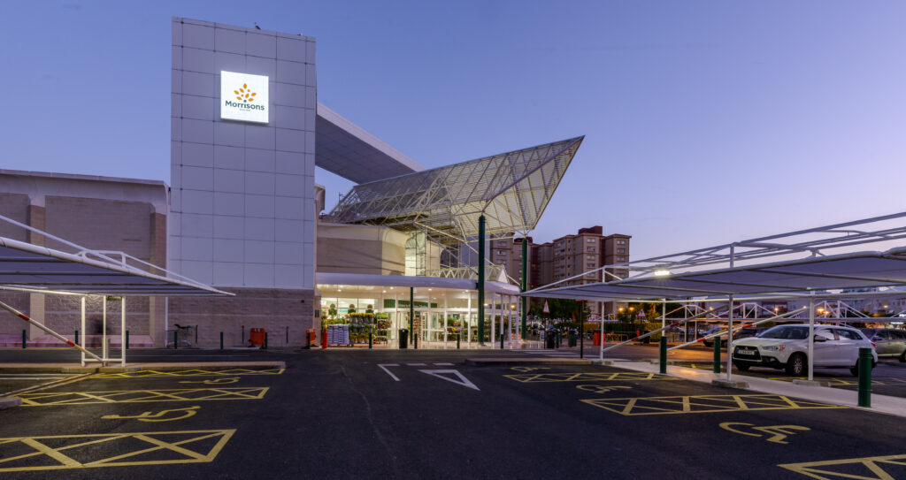 Outside of a Morrisons supermarket, showing external building and disabled carpark